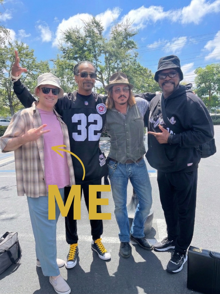 Noland posing outdoors with fellow performers